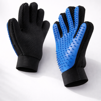 PawGroom silicone grooming glove studio shot — blue and black pair