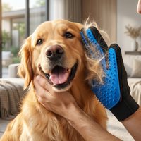 Man grooming golden retriever with PawGroom silicone glove — happy dog