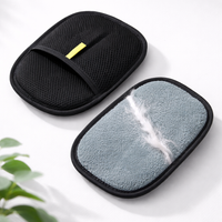 PawGroom furniture hair remover glove — front and back studio shot