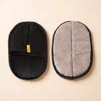 PawGroom furniture mitt — black mesh side and ribbed side